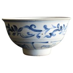 a blue and white bowl on a white background