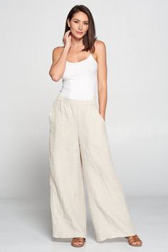 "- Palazzo Pants - Elastic waist - Relaxed comfortable pants - Wide leg full length - Side pockets - Comfortable breezy - Great for any occasion - 100% linen - Made in USA Size measurements Style was measured laid flat. Please multiply by two to get approximate circumference *Small waist : 14.5\" waist stretched : 19\" hip : 23\" rise : 14\" inseam : 27\" outseam : 39\" *Medium waist : 15.5\" waist stretched : 20\" hip : 24\" rise : 14.5\" inseam : 27.5\" outseam : 39.5\" *Large waist : 16.5\" w Linen Palazzo Pants, Linen Harem Pants, Womens Trousers, Comfortable Pants, Wide Leg Linen Pants, Pants With Pockets, Pants Wide Leg, Palazzo Pants, Small Waist