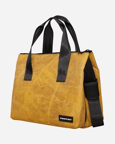 a yellow bag with black straps on the front and side pockets, sitting against a white background