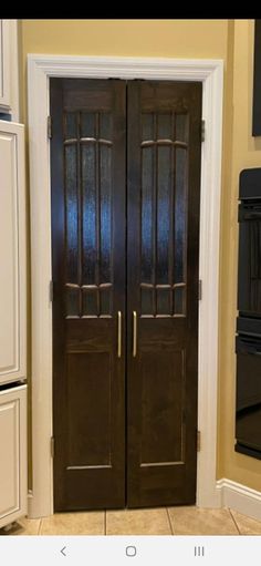 an image of a kitchen setting with double doors