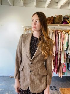 Vintage Givenchy Brown Wool Striped jacket in great vintage condition. Beautiful light toasted brown jacket wool shell with signature satin lining. Shoulder pads for strength. Inner pocket. Two button closure at waist, two flap pockets at hips. Dry clean only. Fits M best. Approx. Measurements: Underarm to underarm: 20" Length: 30" Brown Fitted Outerwear With Single Button, Fitted Brown Outerwear With Single Button, Brown Fitted Tweed Jacket With Single Button, Brown Single Button Fitted Tweed Jacket, Fitted Brown Blazer With Welt Pockets, Fitted Brown Tweed Jacket With Single Button, Fitted Brown Single Button Tweed Jacket, Spring Fitted Brown Sport Coat, Fitted Brown Sport Coat For Spring