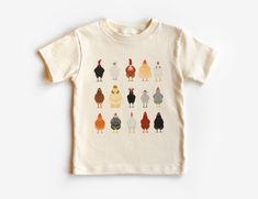 Chicken Farm Animal Toddler Shirt, Free Range Kid, Cute Farming Shirts, Natural Toddler Youth Tee If you love super soft, lightweight, extremely comfy shirts and baby bodysuits then you will absolutely love our unisex kids shirts and baby bodysuits! These shirts are hand printed with a professional garment printer for a soft, durable, long lasting, printed graphic using high quality water based inks. * The printed design is very soft to the touch due to our printing process blending the eco-frie Organic Cotton Pre-shrunk Short Sleeve Tops, Pre-shrunk Organic Cotton Short Sleeve Tops, Organic Cotton Crew Neck Top With Funny Print, Cute Organic Cotton Short Sleeve Tops, Cute Short Sleeve Organic Cotton Tops, Unisex Printed White Tops, Unisex White Printed Tops, Cute White Organic Cotton Tops, Unisex Organic Cotton Screen Print Tops