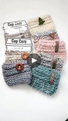 crocheted cup cozys with buttons on them