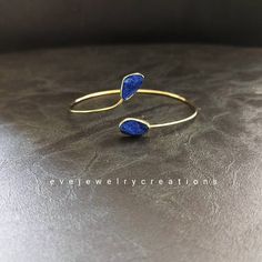 Hand made lapis lazuli bangle bracelet, with a 18k yellow gold finish. Gold Lapis Lazuli Bracelet With Gemstone, Gold Lapis Lazuli Gemstone Bracelet, Blue Brass Bracelet, Gold Lapis Lazuli Bracelets For Gift, Always And Forever, Druzy Ring, Bangle Bracelet, Lapis Lazuli, Gold Finish