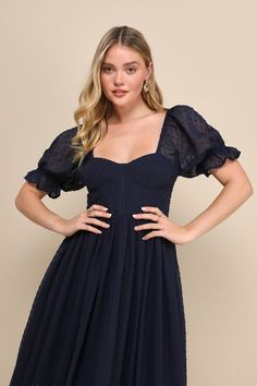 A seasonless piece like the Lulus Flawless Elegance Navy Swiss Dot Puff Sleeve Bustier Midi Dress is ready to impress at every special occasion! Lightweight woven chiffon boasts an array of delicate Swiss dots throughout as it shapes a bustier-inspired bodice with padded cups and supportive boning, a sweetheart neckline, and sheer puff sleeves (with elastic at the shoulders and cuffs). The high, fitted waist tops a twirly, skater-style midi skirt midi hem with an extra layer of tulle beneath, ad Bustier Midi Dress, Swiss Dot Dress, Lulu Fashion, Skater Style, Skirt Midi, Swiss Dot, Full Skirt, Sweetheart Neckline, Puff Sleeves