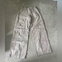 The Cutest Low Rise Cargos From Motel Rocks! High Waist Beige Cargo Pants For Streetwear, Beige Utility Full-length Bottoms, Beige Full-length Bottoms With Pockets, Beige Full Length Bottoms With Pockets, Full Length Beige Bottoms With Pockets, Neutral Wide Leg Bottoms With Cargo Pockets, Neutral Wide-leg Bottoms With Cargo Pockets, Casual Straight Leg Neutral Cargo Pants, Casual Mid-rise Beige Pants