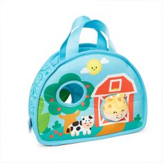 a small blue bag with animals and farm scenes on it's front, inside the shape of a barn