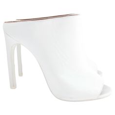 Minimalist cool Givenchy heeled mule sandals - worn once and come with dustbag of times. Made from bone white leather, they have horizontally cut tops, peep toes and stilettos heels. Size 36/UK3. Measure approx 9.25” heel to toe and heel 4”. Have few very light surface marks - nothing noticeable when worn Givenchy Heels, White Mules, Stilettos Heels, Riccardo Tisci, Heeled Mule, Heeled Mules Sandals, Cut Top, Bone White, White Heels