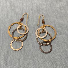 Nwot Gold, Silver, Bronze Connected Hoop Dangle Earrings Never Worn Nickel-free Small Hoop Metal Earrings, Nickel-free Hoop Metal Jewelry, Nickel-free Silver Jewelry In Mixed Metal, Nickel-free Silver Mixed Metal Jewelry, Nickel-free Circular Metal Jewelry, Hammered Metal Hoop Jewelry, Single Small Hoop Earring In Metal, Single Hoop Earring In Metal, Nickel-free Small Metal Hoop Earrings