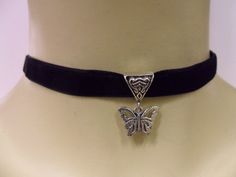 "This is a pretty hand made black velvet choker with a tibetan silver butterfly charm. The velvet is 10mm wide (approx half an inch). Measures approx. 13\" long plus a 1.5 inch extension chain. If you would like a longer, or shorter length, let me know, and i'll make the size you want. Thanks for looking!" Handmade Black Butterfly Jewelry, Party Butterfly Charm Choker, Nickel-free Black Choker As A Gift, Elegant Butterfly Charm Choker Jewelry, Elegant Black Necklace With Butterfly Charm, Black Velvet Choker, Heart Themed, Velvet Choker, Pretty Hands