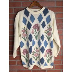 Features: * Vintage Alfred Dunner Women's Knitted Sweater * Super Soft * Oversized * Argyle Floral Pattern * Size Medium * Sweater * Fall, Winter * Floral * Made in Hong Kong * Embroidered * Crew Neck * Long Sleeve * Ribbed Neckline, Cuffs, and Hemline * 80% Acrylic, 20% Nylon * Made in Hong Kong Size: Womens M Condition: Pre-Owned Spring Crew Neck Sweater With Fair Isle Pattern, Spring Fair Isle Crew Neck Sweater, Bohemian Sweater With Textured Knit And Crew Neck, Bohemian Crew Neck Sweater With Textured Knit, Bohemian Textured Knit Sweater With Crew Neck, Bohemian Fair Isle Sweater For Spring, Bohemian Crew Neck Knit Sweater, Vintage Cotton Sweater With Fair Isle Pattern, Vintage Cotton Fair Isle Sweater