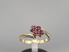 Vintage 14k Yellow Gold Garnet Cluster Ring Size 6.25 Item w#1957 Clean and in good condition  Ring can be sized by your local jeweler Welcome to Westgate Jewels!! We specialize in vintage estate, designer, and fine jewelry. Our shop consists of items that are estate, antique, and / or vintage conditions unless otherwise noted. This means that most items are prior owned and may have some imperfections such as light scratches, scuffs, and / or patina. Our items are cleaned and polished profession Gold Garnet Ring Vintage, Heirloom Garnet Cluster Ring, Vintage Garnet Cluster Ring, Vintage Garnet Ring Gift, Vintage Garnet Rings With Polished Finish, Dainty Ruby Ring, Garnet Ring Vintage, Baby Ring, Vintage Native American Jewelry