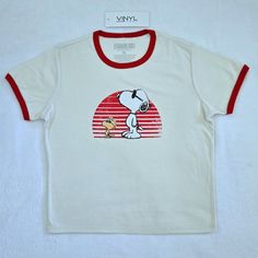 Brand New With Tags Peanuts Snoopy And Woodstock With Shades Baby Tee Excellent Condition With No Flaws Size Juniors X-Large Approx Measurements Laying Flat: Length 21" Armpit To Armpit 19.5" Across Bottom Hem 18.5" 60% Cotton 40% Polyester Color Of Tee Is A Light Cream With A Graphic On Front Of Snoopy And Woodstock Wearing Sunglasses Facing West Baby Doll Style Tee, Crew Neck With Red Banded Neckline, Short Sleeves With Red Banded Hems, Straight Bottom Hem Please No Trades Or Lowballs! *Ask An Snoopy Shirt, Snoopy T Shirt, Wearing Sunglasses, Red Band, Snoopy And Woodstock, Peanuts Snoopy, Light Cream, Baby Tee, Woodstock