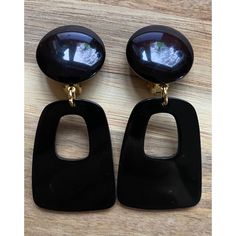 Modern Dangling clip on earrings. Large angular black plastic hoops with clip on closures.  Lightweight neutral look - goes with everything! Earrings come with silicone pads for added comfort.  Earrings are not intended to be worn while sleeping bathing or swimming. Not recommended for children under three. See more: https://www.etsy.com/ca/shop/CleverLittleEars CANADIAN PRICES INCLUDE GST/HST WHERE APPLICABLE. ETSY WILL CALCULATE ANY PST OWING AT CHECKOUT. While the cost of shipping makes returns or exchanges impractical, please do contact me with any concerns about your order and we will work together to address them.  By law, European buyers have 14 days from receipt to request a return. Return shipping costs will not be covered by CleverLittleEars. Handmade Clip On Earrings, Diy Clip On Earrings, Earrings Dangling, Geometric Earrings, Crafty Things, Black Plastic, Clip On, Modest Fashion, Clip On Earrings