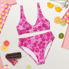 Get ready to make a splash in our Raspberry Pinks Hawaiian Flowers High-Waisted Bikini! This playful and eye-catching swimsuit features beautiful Hawaiian flowers and a high-waisted design for a flattering fit. Say aloha to the beach in style with this fun and fashionable piece. • Double-layered and non-reversible• Removable padding• Tear-away care label• Zig-zag stitching *Separates (Top and Bottom) with this design are listed and sold separately.This product is made especially for you as soon Floral Print Surfing Swimwear Beachwear, Printed High Waist Swimwear For Beach, High Waist Printed Swimwear For Beach, Beachwear Swimwear With Floral Print For Surfing, Pink Hibiscus Print Swimwear For Summer, Tropical High Waist Beach Swimwear, Tropical High Waist Swimwear For Beach, High Waist Tropical Swimwear For Beach, Pink Printed Tankini For Vacation