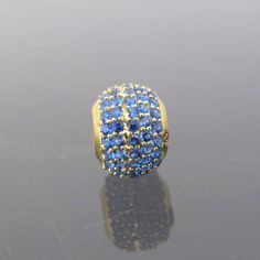 Vintage 18K Solid Yellow Gold Blue Sapphire Ball Slide Pendant...Marked 18K...Total of weights 1.4gramsWith 48 Blue Sapphire's 1.5MM ( .01ct x 48 = .48ct ) Measure of Ball 7.5 x 10MM ...It's in very good condition. Gold Sapphire Jewelry With Pave Setting, Blue Cubic Zirconia Jewelry With Pave Setting, Luxury Blue Rondelle Jewelry, Blue Round Jewelry With Pave Setting, Blue Round Beads Jewelry For Anniversary, Solid Yellow, Pendant Necklaces, Blue Sapphire, Jewelry Necklace Pendant