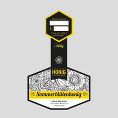 a black and yellow label with the word hong on it's front corner