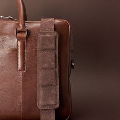 The Gazeli Briefcase; functional minimalist design, made for daily use, perfect for travel or work. Features a laptop divider, padded shoulder straps and bottom, slim profile, and a quick access front pocket. Our designer briefcase is the perfect gift for men that love clean designs: simple and functional. Handcrafted in our workshop by skilled artisans. Outstanding attention to detail and premium materials makes it a unique piece. Modern Rectangular Bag Strap For Travel, Rectangular Leather Bag Strap For Travel, Classic Leather Bag Strap For Travel, Leather Travel Bag Strap With Leather Handles, Leather Bag Strap With Handles For Travel, Modern Brown Rectangular Bag Strap, Luxury Travel Rectangular Bag Strap, Leather Rectangular Case With Luggage Sleeve, Leather Case With Luggage Sleeve