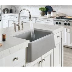 the kitchen sink is clean and ready to be used for cleaning up in the house