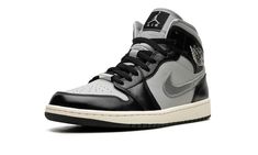 The Women’s Air Jordan 1 Mid SE "Black/Chrome" is a women’s-exclusive colorway of the casual sneaker with a versatile look.  The upper features a Light Smoke Grey leather base contrasted with glossy black leather overlays.  A Metallic Silver leather Swoosh is seen on both sides of the shoe.  Classic “Wings” branding is found on the collar in metallic silver.  A chrome lace dubrae is found on the vamp.  An off-white hue for the midsole cadds an aged effect.  Release date: October 3, 2023 Chrome Shoes, Black And Grey Jordans, Nike Jordan Air 1, Grey Jordans, Air Jordan 1 Mid Se, Preppy Shoes, Womens Air Jordans, Halloween 2024, Black Chrome