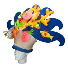 This Coral Reef Hat will definitely make you stand out at your next Party, Hora Loca, Wedding, Corporate Event, Birthday, Quinceanera, or Halloween Party! It can be used as a wedding hats, top hats, photo booth props, or a party favor. Whimsical Tall Crown Headpiece For Carnival, Themed Cap For Costume Party, Novelty Hats For Carnival Costume, Novelty Costume Hats For Carnival, Fun Costume Hats For Carnival And Themed Events, Fun Hats For Birthday And Carnival, Novelty Hats For Carnival Costume Party, Novelty Hats For Carnival Themed Events, Themed Party Hat For Carnival