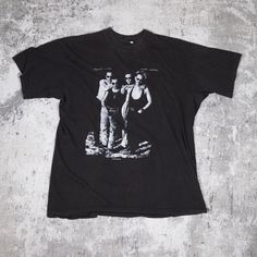 World Violation Tour 1990 SIZE:  XL MEASUREMENT: 23x29.5 COLOR: Black YEAR: 1990  TAG: XL FABRIC: Poly/Cotton Please be advised that all of our vintage items are one-of-a-kind and have undergone numerous washes and wears. As a result, they may display holes, stains, and and various degrees of fading due to their age and usage. We firmly believe that these traits are what make each item unique and special. All sales are final. We do not accept returns or exchanges. Vintage Washed Black T-shirt For Concert, Vintage Crew Neck Tops For Concerts, 90s Vintage Print Black T-shirt, Black Grunge T-shirt With Vintage Print, Black 90s Vintage Print T-shirt, 90s Style Black T-shirt With Vintage Print, Black Vintage Print T-shirt For Streetwear, Vintage Print Tops For Concert, Retro Washed Black Top For Streetwear