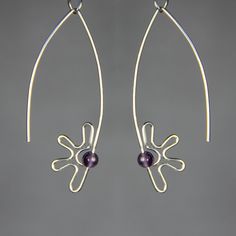 This unique flower hoop earrings are handmade using 999 sterling silver and amethyst. The last two pictures are the matching bracelet. The Length of the earrings is 2 inches / 50 mm. ;-) My contact number: 626-379-1904. Please contact me if you would like to order multiples or customize a design for your special event, I will be pleased to give you a discount on a quantity order. ;-) Purchases will be shipped within 1-3 business days. In case of occasional shortage of beads material, purchases w Flower Hoop Earrings, Jewelry Tattoo, Earrings Bridesmaid, Diy Wire Jewelry, Beaded Material, Matching Bracelets, Bridesmaid Earrings, Bridesmaids Gifts, Diy Earrings