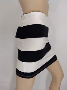 "Women's Mini Skirt  Black White Excellent LIKE NEW w Tags Condition Vintage by Size 8 by H&M  Seriously cool! 80's style mini skirt, Elastic waist, black and white thick stripe print, stretchy 95% COTTON fabric. Like new with ORIGINAL TAGS condition. Super high quality. Designer lux expensive. Easy to wear casual chic vintage for the disco sporting life. MEASUREMENTS: Length -  15\" Waist  - 29\" Hips - 34-36\" MODEL STATS: Ht. - 5' 8.5\" Bust - 35\" Waist - 25\" Hips - 35\" *Please check measu Retro Black Mini Skirt For Summer, Retro Mini Skirt With Stretch, Trendy Striped Fitted Skirt, Trendy Fitted Striped Skirt, 80s Womens Fashion, Galaxy Stuff, Punk Skirt, Style Mini Skirt, Carrie White