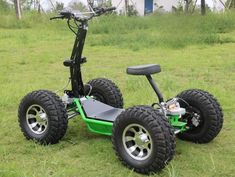 an electric scooter is parked in the grass