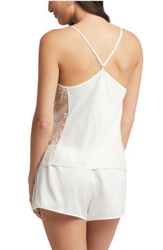 Silky charmeuse beautifully glides down your figure on this drape-neck chemise simply detailed with sheer lace sides. 23" top length; 2" inseam; 13 1/2" leg opening; 10 1/2" front rise; 12" back rise Top has drape neck; adjustable straps Shorts have elastic waist 100% polyester Hand wash, dry flat Imported Lingerie Satin Camisole With Built-in Bra For Loungewear, Satin Sleepwear With Built-in Bra For Wedding Night, Elegant Satin Sleepwear With Built-in Bra, Chic Fitted Silk Sleepwear, Chic Sleepwear With Spaghetti Straps For Wedding Night, Elegant Camisole Sleepwear For Night, Elegant Camisole Sleepwear, Elegant Camisole Slip For Sleep, Elegant Lace Sleep Slip