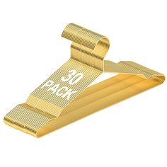 a pair of gold clips with the word $ 3 99 on each end and one piece missing