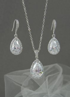 Crystal Bridal Earrings. Crystal wedding by CrystalAvenues on Etsy Crystal Teardrop Pendant Jewelry Sets As Gifts, Wedding Crystal Jewelry Sets With Earrings, Crystal Drop Jewelry Sets For Anniversary, Anniversary Jewelry Sets With Sparkling Teardrop Stones, Anniversary Teardrop Jewelry Sets With Sparkling Stones, Silver Crystal Wedding Earrings, Crystal Teardrop Earrings For Wedding, Crystal Teardrop Wedding Earrings, Wedding Crystal Jewelry Sets With Teardrop Shape