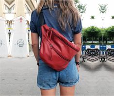 This handmade smart leather belt bag/fanny pack can be carried cross-body/ on the shoulder/ on the waist, crafted in rich soft premium Italian Napa leather, featuring; a leather adjustable belt, Safety matte black buckle safety closure, 3 main large cabins, 1 is hidden at the back,1 half-moon front, 1 flat at the front with full zipper closure. Its ideal clean modern look is suitable for everyday style & use - See more at: http://www.etsy.com/shop/JUDtlv * Now on Sale! * UNISEX  * Handmade limited edition & Ready to ship * Soft Italian leather * Water pigment-dye Nappa leather  * 3in1 - Shoulder / Waist / Crossbody * Worldwide low-cost shipping * Practical & trendy, perfect for long-day activities * Lightweight  * Perfect as a gift * Adjustable strap Shipping - * For EU / Asia / Australia Fannie Pack, Handmade Leather Bag Woman, Soft Leather Hobo Bag, Waist Bag Leather, Burberry Baby, Red Leather Bag, Leather Waist Bag, Sewing Bags, Soft Leather Bag