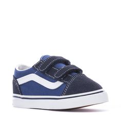 Keep your kids' look classic in the Vans Old Skool V toddlers' sneakers. Originating from the popular Old Skool, the Old Skool V features the same infamous sidestripe, suede uppers, and padded collars. These skate shoes go the long haul no matter what your day has in store. Two hook and loop straps for secure fit. Sturdy canvas and suede uppers. Re-enforced toecaps to withstand wear and tear. Midsole cushioning for all-day comfort. Padded collars for support and flexibility. Signature Vans waffl Vans Low-top Sneakers For School, Sporty Vans Sneakers For School, Sporty School Sneakers By Vans, Long Haul, Vans Old Skool, Side Stripe, Old Skool, Hook And Loop, Skate Shoes