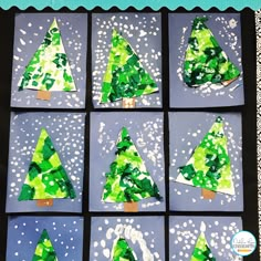 the paper christmas trees are cut into squares