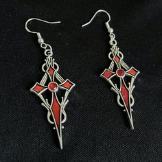 Goth style earrings. Luxury pendants. Sterling silver hooks. Alternative earrings. Handmade Metal Jewelry For Concert, Emo Dangle Metal Jewelry, Emo Style Metal Dangle Jewelry, Silver Metal Emo Style Earrings, Silver Metal Emo Earrings, Emo Metal Earrings For Gift, Emo Style Pierced Metal Earrings, Emo Style Metal Earrings For Gift, Gothic Pierced Jewelry For Concerts