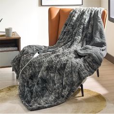 a chair with a blanket on top of it