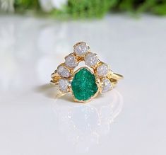 Raw Emerald and diamond Chevron bridal ring set in 18k Gold Wedding Ring Set Unique, Raw Stone Engagement Rings, Raw Emerald, Gold Chevron, Diamond Wedding Rings Sets, Chevron Ring, Diamond Wedding Ring, Wedding Ring Set, Uncut Diamond