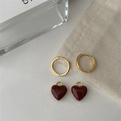 Fall in love with our Cute Burgundy Red Heart Pendant Earrings. These charming earrings feature a delicate burgundy red heart pendant that adds a touch of sweetness to any outfit. Perfect for expressing your love or adding a pop of color to your look. Peach Earrings, Red Love Heart, Color Circle, Red Love, Alloy Earrings, Heart Dangle Earrings, Popular Jewelry, Heart Drop Earrings, Ring Pendant Necklace