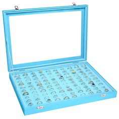 a blue jewelry box filled with lots of rings