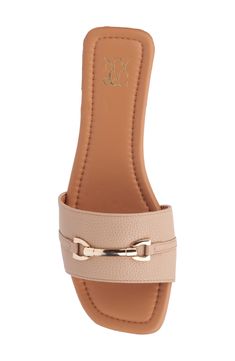 A gleaming horse-bit buckles adds an elegant detail to a slim-soled slide sandal. Synthetic upper and lining/rubber sole Imported Open Toe Slides With Gold Buckle For Spring, Spring Open Toe Slides With Gold Buckle, Spring Slides With Gold Buckle And Open Toe, Chic Slide Mules With Buckle Closure, Flat Sandals With Tang Buckle, Elegant Flat Slides With Textured Footbed, Elegant Open Toe Sandals With Horsebit Detail, Elegant Mules With Buckle Closure In Slide Style, Elegant Slide Mules With Buckle Closure