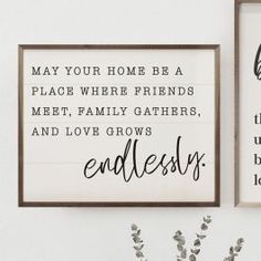 two framed signs with the words, may your home be a place where friends meet family gathers and love grows endlessly