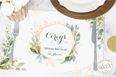 a place setting for a bridal bridal party with flowers and gold foil on it