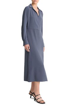 A streamlined take on the shirtdress, this cream-colored option exudes elegance and ease. 49 1/2" length (size Medium) Notched collar Surplice V-neck Long sleeves with one-button cuffs Unlined 100% polyester Dry clean or hand wash, line dry Imported Solid V-neck Workwear Dress For Fall, Fall Workwear V-neck Dress, Classic V-neck Shirt Dress For Work, Chic V-neck Midi Dress For Business, Elegant V-neck Midi Dress For Daywear, Formal Collared Solid Midi Dress, Elegant Collared Midi Dress With Placket, Formal Solid Collared Midi Dress, Formal Viscose Shirt Dress For Fall