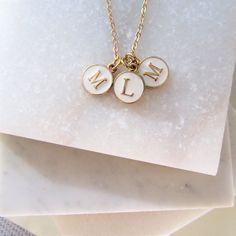 Three Initial Charm Necklace. A special gift for Mom or Grandma this Mothers Day.  An initial for each special child. A personalized gift is always extra special.  Your choice of 3 letter charms. A simple elegant everyday necklace, can be worn alone or layered up with other favourites.  All items will come beautifully presented on a display card and place in an organza gift bag, all ready for gift giving. Details: dimensions: Charm Measures 15mm Please note that some charms have a slightly diffe White Round Initial Necklace For Anniversary, Mother's Day Personalized Initial Necklace With Letter Beads, Mother's Day Personalized Gift Initial Necklace With Letter Beads, Mother's Day Personalized Letter Beads Initial Necklace, White Initial Pendant Charm Necklace, White Initial Pendant Charm Necklaces With Letter Beads, White Initial Pendant Charm Necklace With Letter Beads, Dainty Charm Necklaces With Letter Beads For Personalized Gift, Dainty Letter Beads Charm Necklace For Personalized Gift