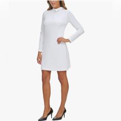 Calvin Klein's Long Sleeve Sheath Dress Features A Chic Mock Tie Neck That Will Be Sure To Take You From Desk To Dinner. About This Item Features: Round Neck, Straight Fit, Long Sleeves, Neck Tie Detail From Desk To Dinner: Flaunt Your Calvin Klein Dresses At Work, On A Night Out, Or Even Just As Part Of Your Daily Outfit; Our Versatile Work Dresses For Women Pair Perfectly With Heels, Sandals, Jackets Or Coats Travel Essentials: Take This Dress With You On A Weekend Getaway Or A Business Trip; Long Sleeve White Dress Short, Black Work Dresses, Belted Shift Dress, Calvin Klein Black Dress, Long Sleeve Sheath Dress, Tie Maxi Dress, Work Dresses For Women, White Long Sleeve Dress, Work Dresses