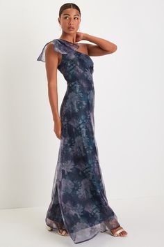 Bring on the Prosecco and adoring glances, because the Lulus Beyond Fabulous Blue Floral Organza One-Shoulder Maxi Dress is ready for any glamorous gala this season! Airy woven organza boasts a stunning floral design throughout as it shapes a sleeveless bodice, a one-shoulder neckline, and a wide strap adorned with an oversized bow detail. The high, fitted waist tops an A-line skirt that cascades down to an elegant maxi hem. Hidden back zipper/clasp. Fit: This garment fits true to size. Length: Chic Off-shoulder Maxi Dress For Evening, Chic Off-shoulder Evening Maxi Dress, Off-shoulder Maxi Dress For Gala Party, Glamorous Purple Off-shoulder Dress, Fitted Silk One Shoulder Dress For Party, Elegant One Shoulder Floor-length Dress For Spring, Glamorous One Shoulder Dress For Spring Gala, Glamorous Off-shoulder Evening Maxi Dress, Blue One-shoulder Dress For Prom