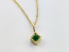 Enchant her this Christmas with memorable gift of this gold emerald necklace. It is made by hands in my little workshop in solid 14k gold. The stone is natural, coming from Earth- not synthetic or lab created. This necklace is in minimalistic style so the woman who loves delicate jewelry is bound to fall in love with it:) The stone is vivid, full of life, beautiful green. It matches perfectly with the square emerald ring from minimalistic collection and square emerald earrings. If you are lookin Emerald Pendant Birthstone Necklace In Yellow Gold, Yellow Gold Emerald Necklace As Gift, Yellow Gold Emerald Pendant Birthstone Necklace, Fine Yellow Gold Emerald Necklace As Gift, Formal 14k Gold Emerald Birthstone Necklace, Emerald Cut 14k Gold Necklace For Gift, Emerald Birthstone Necklace In Yellow Gold As Gift, Emerald Birthstone Necklace In Yellow Gold, Yellow Gold Emerald Necklaces As A Gift