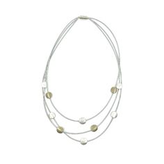 Make a statement with this Boutique Jewelry necklace. It features a tiered design made of piano wire, silvertone discs, and goldtone discs. The necklace is versatile and can be worn with both casual and formal attire. It is a bold and eye-catching piece that adds a touch of elegance to any outfit. Nautical Jewelry, Natural Diamond Engagement Ring, Silver Anklets, Disc Necklace, Childrens Jewelry, Shop Engagement Rings, Custom Jewelry Design, Formal Attire, Diamond Fashion