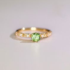 *Condition: Brand new *Center Stone: Natura Olivine from Brazil, Asscher Cut, 5mm, Approx 0.75ct *Side Stone: Natural white diamond, round cut (VS1 clarity and F color) *Ring Weight: 1.86g (depend on the ring size) *Metal Purity: Optional *Each piece is made-to-order with care and special attention to detail. all items are made with conflict-free diamonds and gems. *The item will be gift wrapped and shipped. --------------------------------------------------------- Available in : 14k Rose or Yel Luxury Yellow Gold Peridot Rings, Luxury Green Sapphire Ring With Diamond, Formal Peridot Diamond Ring In Yellow Gold, Luxury Tsavorite Diamond Wedding Ring, Luxury Tsavorite Rings With Brilliant Cut, Heirloom Green Sapphire Ring With Diamonds, Luxury Tsavorite Diamond Ring For Anniversary, Luxury Green Birthstone Ring, Luxury Green Birthstone Ring In 14k Gold